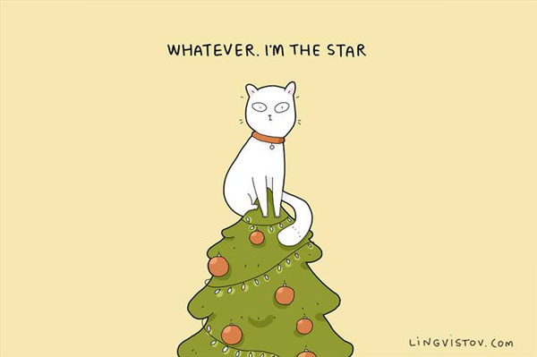 cat perched on xmas tree top comic