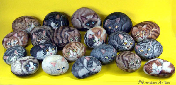 cats painted on rocks