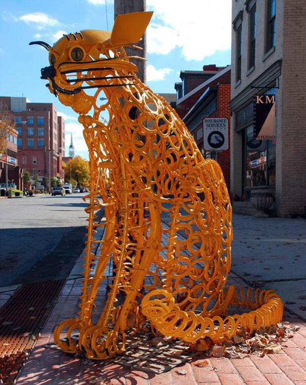horseshoe cat sculpture