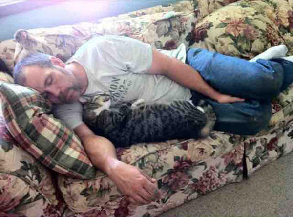 cat and owner napping